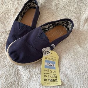Toms brand new with tags slip on shoes. Size Youth 3.5
